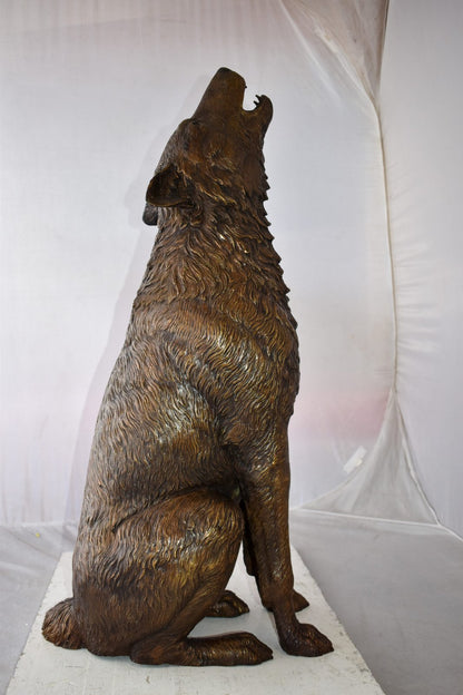 Howling Wolf looking toward the sky Bronze Statue Size: 19" x 19" x 37"H