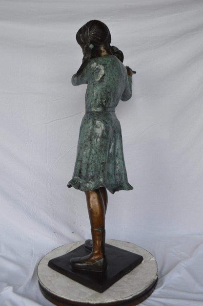 Girl playing flute large bronze statue -  Size: 30"L x 15"W x 50"H.