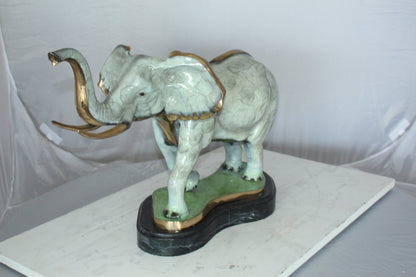 Elephant Medium Bronze Statue -  Size: 26"L x 8"W x 17"H.