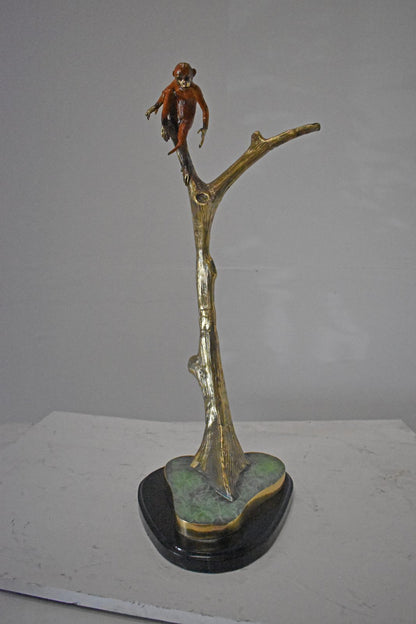 Colored Monkey Resting on a Tree Bronze Statue - Size: 12"L x 13"W x 27"H.