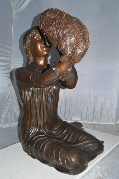 Girl Playing With Her Little Dog Bronze Statue -  Size: 22"L x 22"W x 30"H.