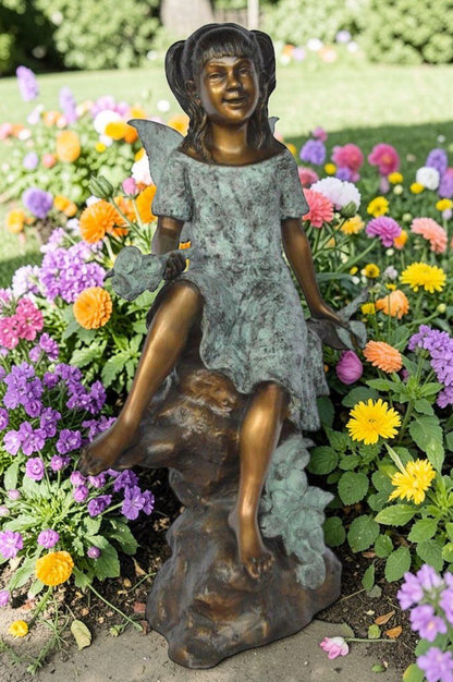 Angel girl sitting with a rose bronze statue -  Size: 22"L x 27"W x 37"H.