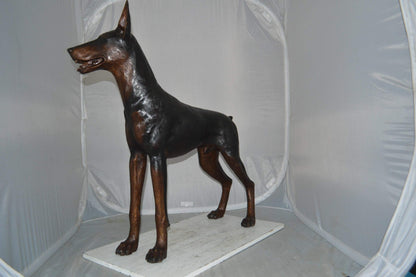 Doberman Dog Bronze Statue -  Size: 36"L x 9"W x 38"H.