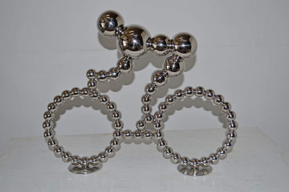 Modern Art Rider on His Bicycle Chrome Statue - Size: 22"L x 4"W x 17"H.