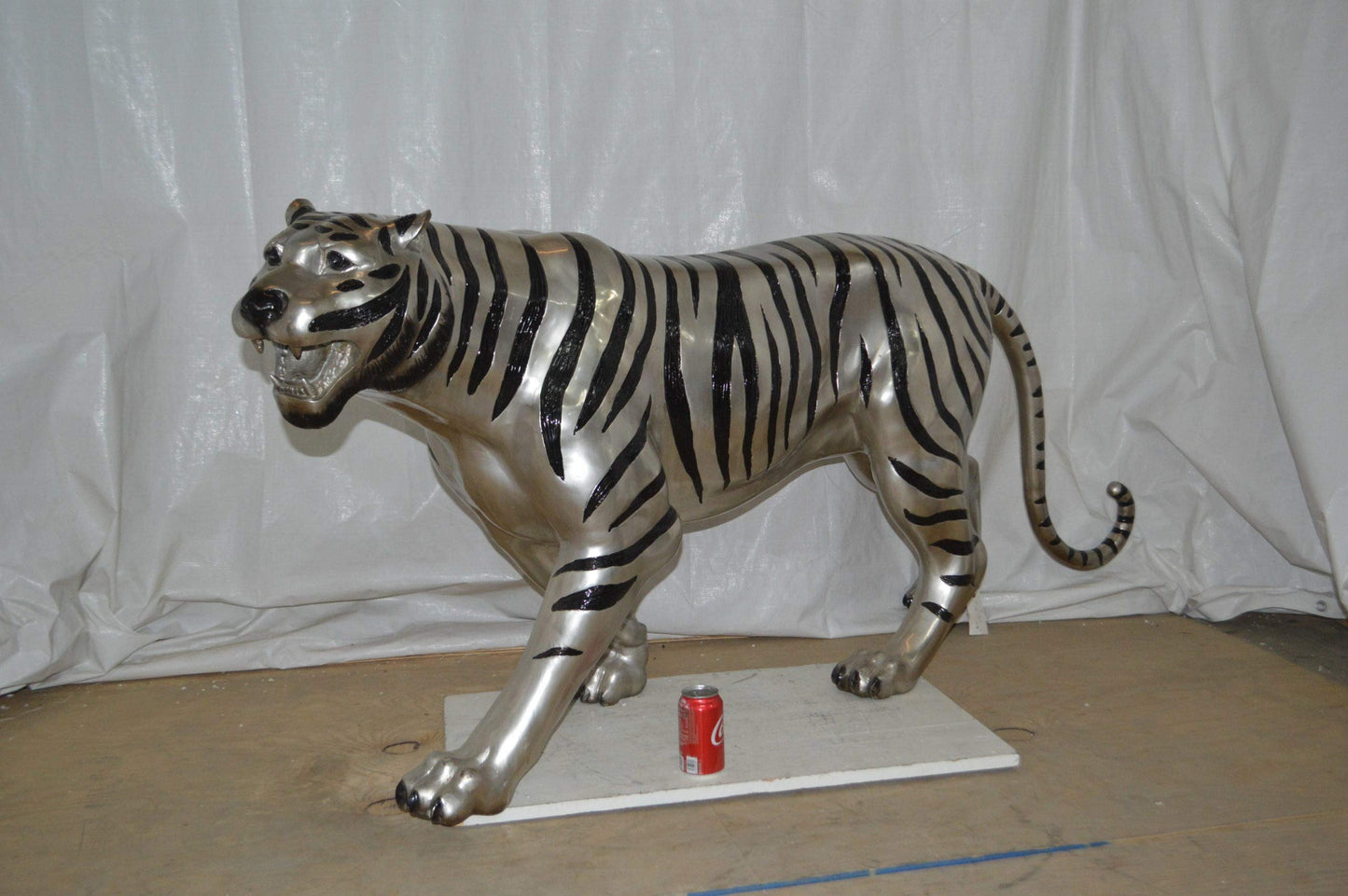 Tiger bronze statue with black and silver finish - Size: 80"L x 15"W x 34"H.