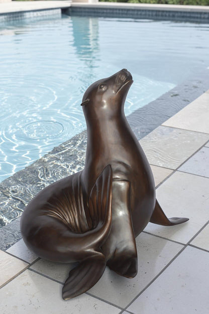 Seal Fountain made of bronze statue - Size: 35"L x 24"W x 27"H.