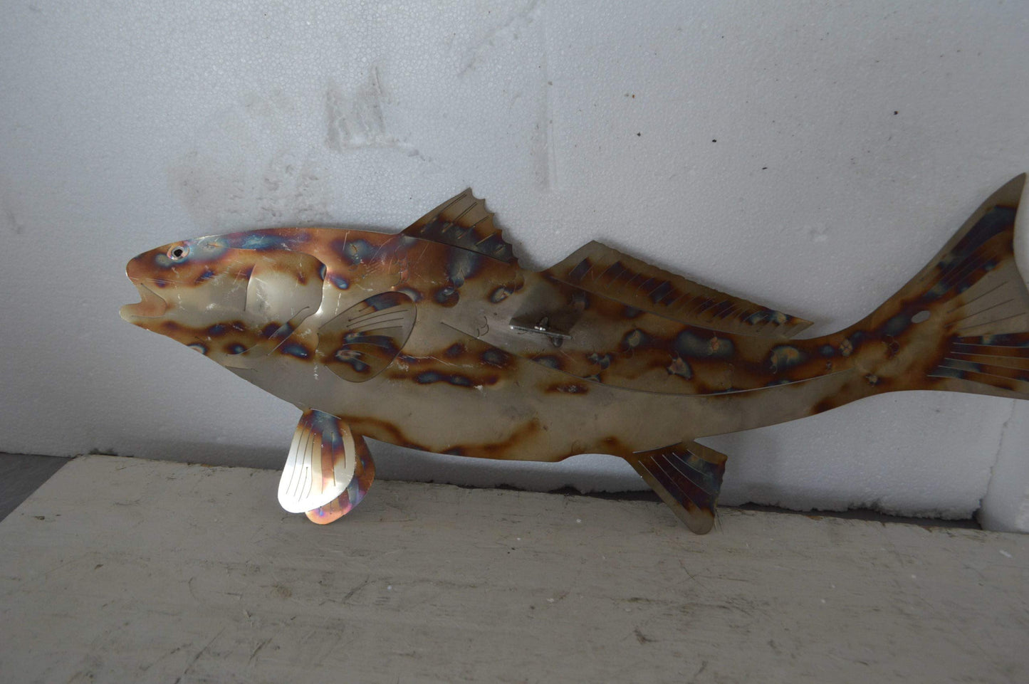 Fish laser cut steel wall mounted - Size: 25"L x 2"W x 9"H.