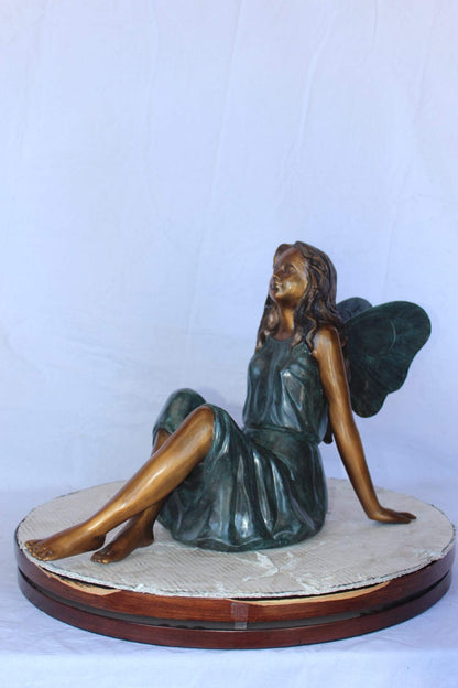 Fairy angel sitting peacefully bronze statue -  Size: 27"L x 12"W x 16"H.