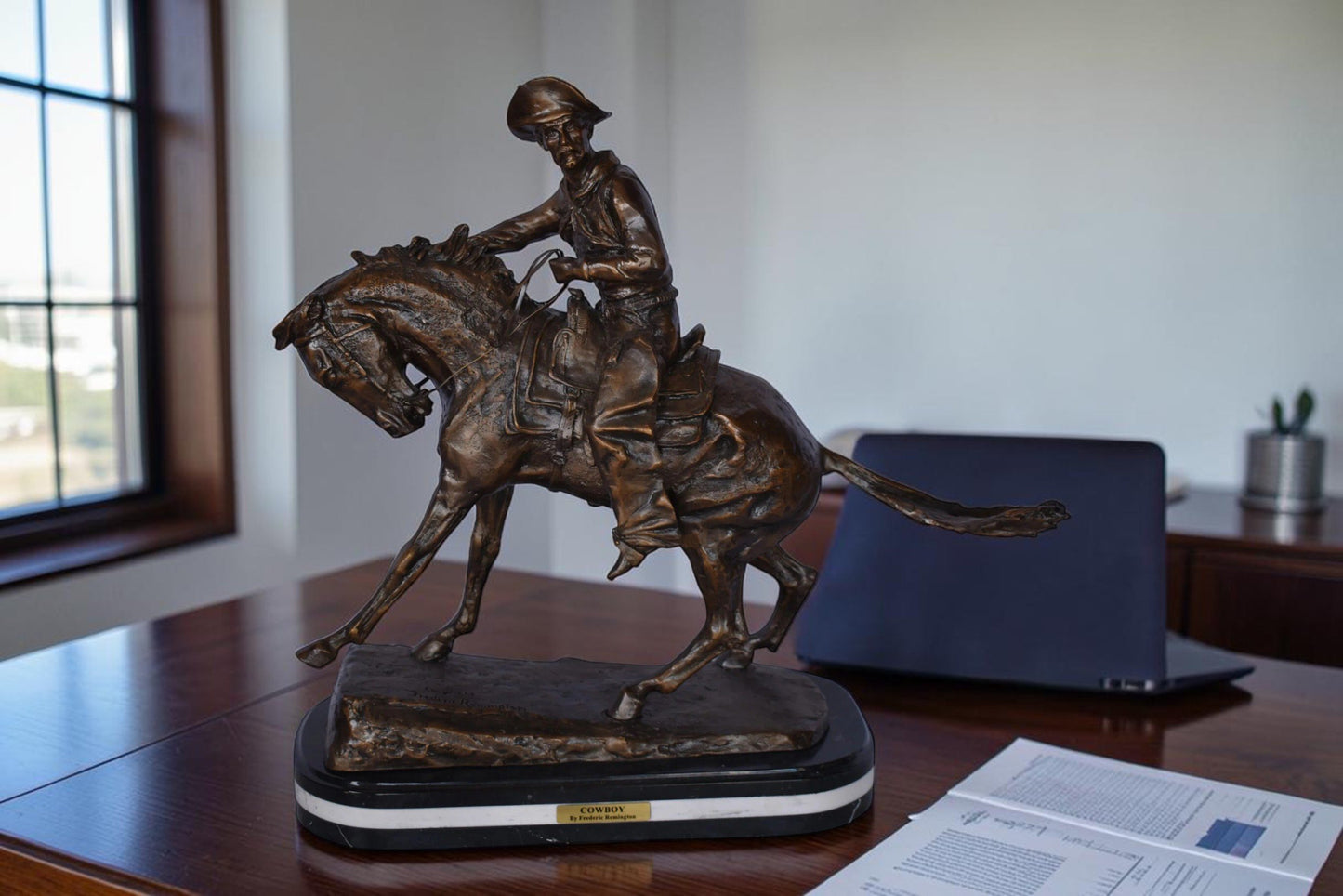 Remington Cowboy Replica Bronze Statue on Triple Marble - Size: 8"x 26"x 23"H.