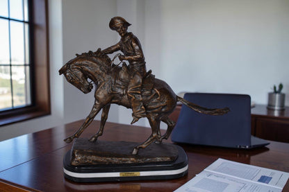Remington Cowboy Replica Bronze Statue on Triple Marble - Size: 8"x 26"x 23"H.