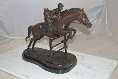 Jockey With Horse Jumping Over Hurdle Bronze Statue Medium  23"L x 10"W x 16"H.
