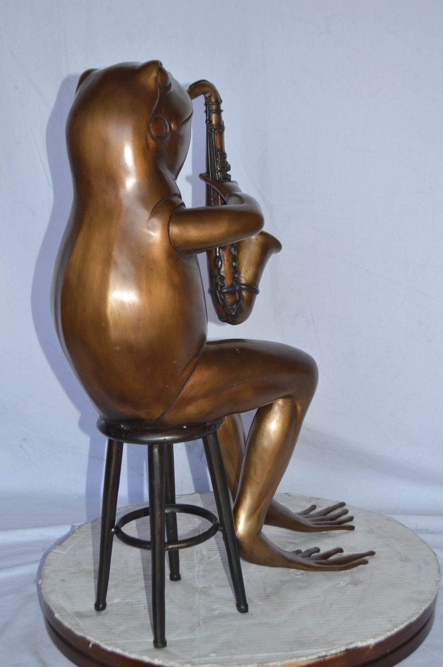 Frog playing saxophone bronze statue - Size: 23"L x 15"W x 30"H.