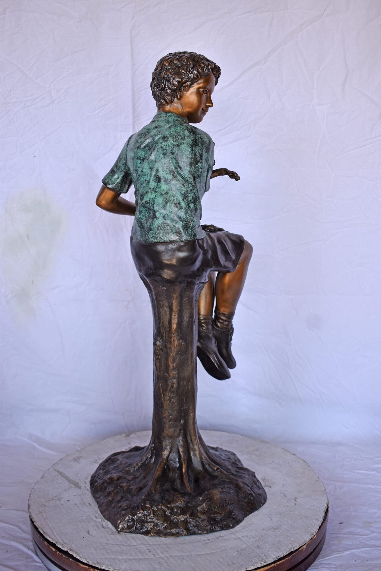 Boy Sitting on A Log with His Puppy Bronze Statue - Size: 15"L x 15"W x 35"H.