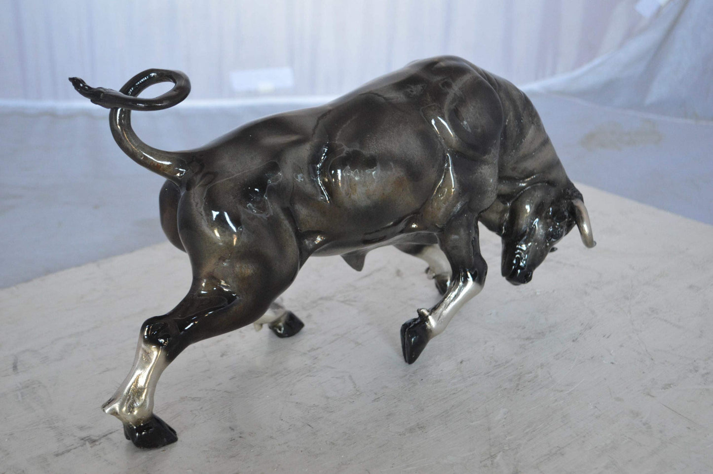 Charging Bull Bronze Statue -  Size: 15"L x 5"W x 8"H.
