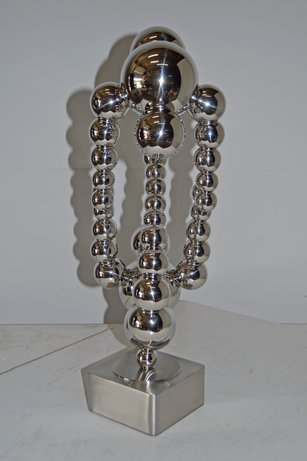 Modern Art Abstract Made of Chrome Balls Statue - Size: 11"L x 10"W x 22"H.