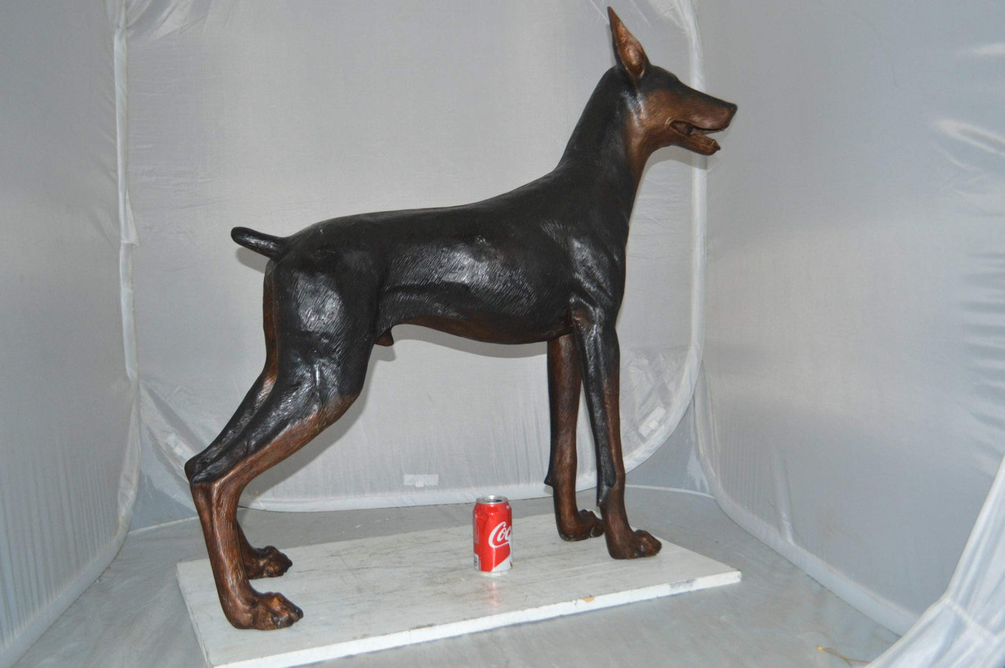 Doberman Dog Bronze Statue -  Size: 36"L x 9"W x 38"H.