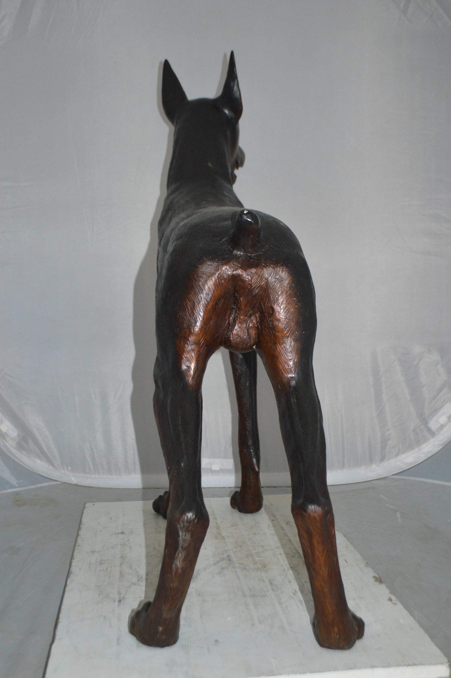 Doberman Dog Bronze Statue -  Size: 36"L x 9"W x 38"H.