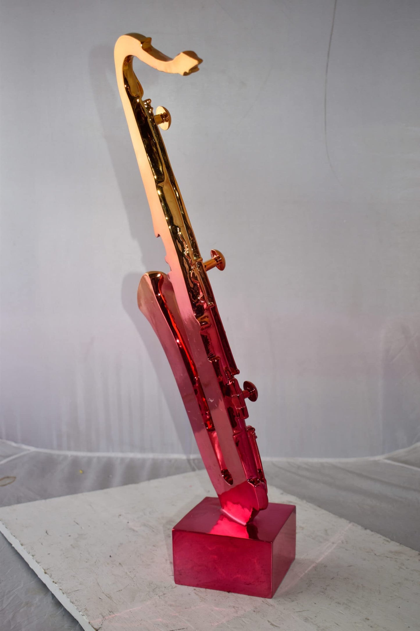 Modern Art Pink and Gold Saxophone Statue Made of Resin Size: 10" x 8" x 28"H
