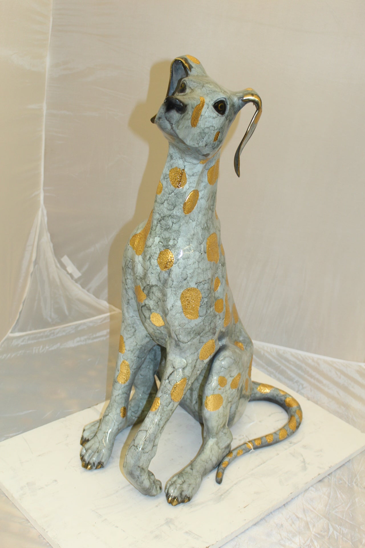 Pair of Golden Pleated Dalmatians Sitting Bronze Statue -  21"L x 16"W x 35"H. 