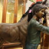 Young Girl and her pony Bronze Statue -  Size: 48"L x 20"W x 48"H.