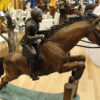 Jockey and Horse Jump a Fence Bronze Statue -  Size: 60"L x 30"W x 51"H.