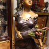 Woman Holding Bouquet Standing on Lily  Bronze Statue/Fountain 28" x27"x 60"H.