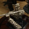 Man playing Flute Bronze Statue -  Size: 10"L x 8"W x 10"H.