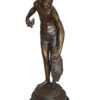 Boy holding a Dog and a Bird Bronze Statue -  Size: 15"L x 15"W x 36"H.