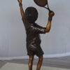 Boy Playing Tennis Bronze Statue -  Size: 12"L x 8"W x 25"H.