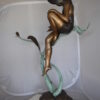 Beautiful Young Girl Sitting on a Tree Bronze Statue -  35"L x 50"W x 55"H.