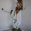 Beautiful Young Girl Sitting on a Tree Bronze Statue -  35"L x 50"W x 55"H.