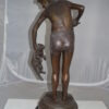 Boy holding a Dog and a Bird Bronze Statue -  Size: 15"L x 15"W x 36"H.