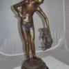 Boy holding a Dog and a Bird Bronze Statue -  Size: 15"L x 15"W x 36"H.