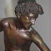 Boy holding a Dog and a Bird Bronze Statue -  Size: 15"L x 15"W x 36"H.