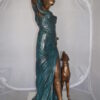 Lady With Her Dog Bronze Statue -  Size: 25"L x 22"W x 50"H.