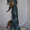 Lady With Her Dog Bronze Statue -  Size: 25"L x 22"W x 50"H.