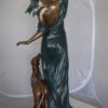 Lady With Her Dog Bronze Statue -  Size: 25"L x 22"W x 50"H.