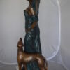 Lady With Her Dog Bronze Statue -  Size: 25"L x 22"W x 50"H.