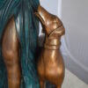 Lady With Her Dog Bronze Statue -  Size: 25"L x 22"W x 50"H.