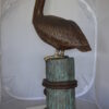 Pelican on a Stump Bronze Statue -  Size: 14"L x 38"W x 58"H.