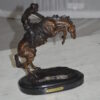 Bronco Buster by Remington Bronze Statue -  3" x 7" x 10"H.