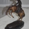 Bronco Buster by Remington Bronze Statue -  3" x 7" x 10"H.