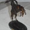 Bronco Buster by Remington Bronze Statue -  3" x 7" x 10"H.