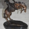 Bronco Buster by Remington Bronze Statue -  3" x 7" x 10"H.