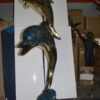 Two Dolphins Overreach Others on Waves Bronze Statue -  44"L x 23"W x 76"H.