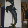 Two Dolphins Overreach Others on Waves Bronze Statue -  44"L x 23"W x 76"H.