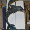 Two Dolphins Overreach Others on Waves Bronze Statue -  44"L x 23"W x 76"H.