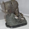 Bison Bronze Statue -  Size: 7"L x 14"W x 15"H.