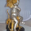 Cupid Girl On A Rock Bronze Statue  -  Size: 20"L x 15"W x 25"H.