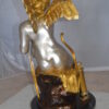 Cupid Girl On A Rock Bronze Statue  -  Size: 20"L x 15"W x 25"H.